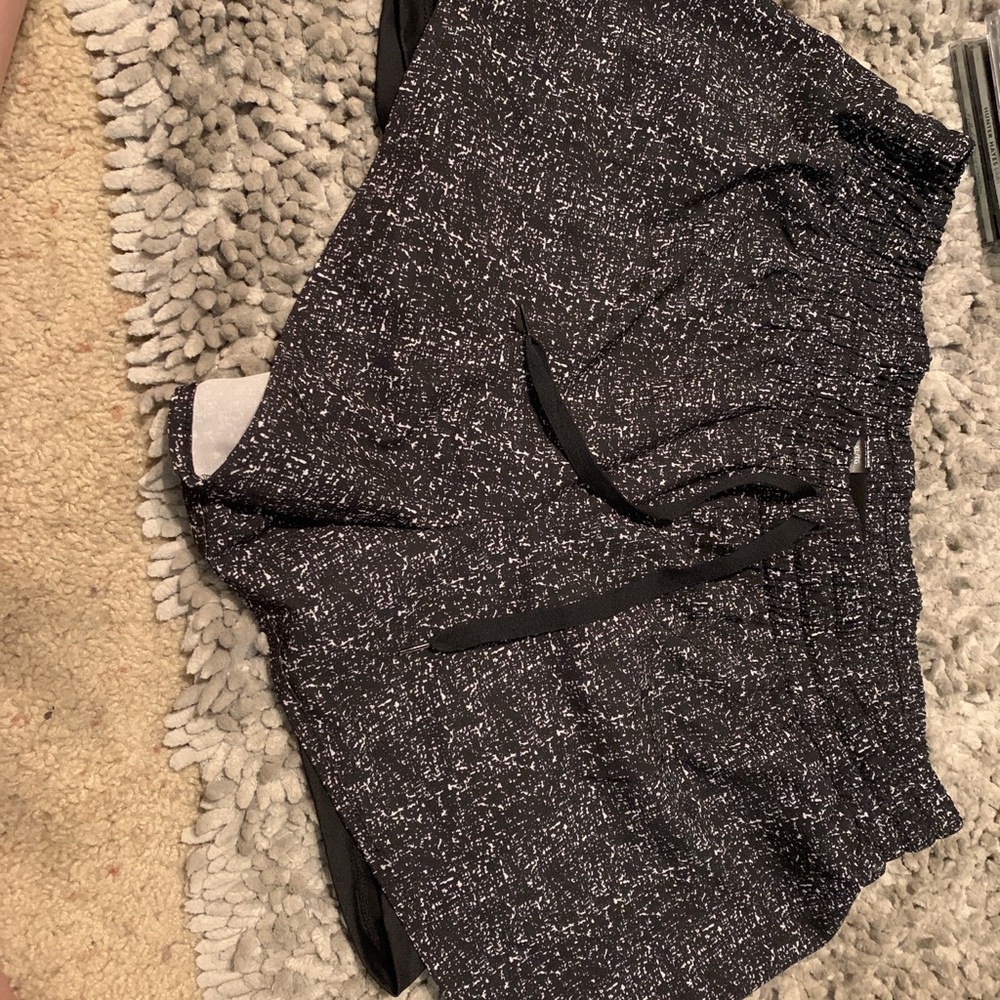 Two pairs of running shorts